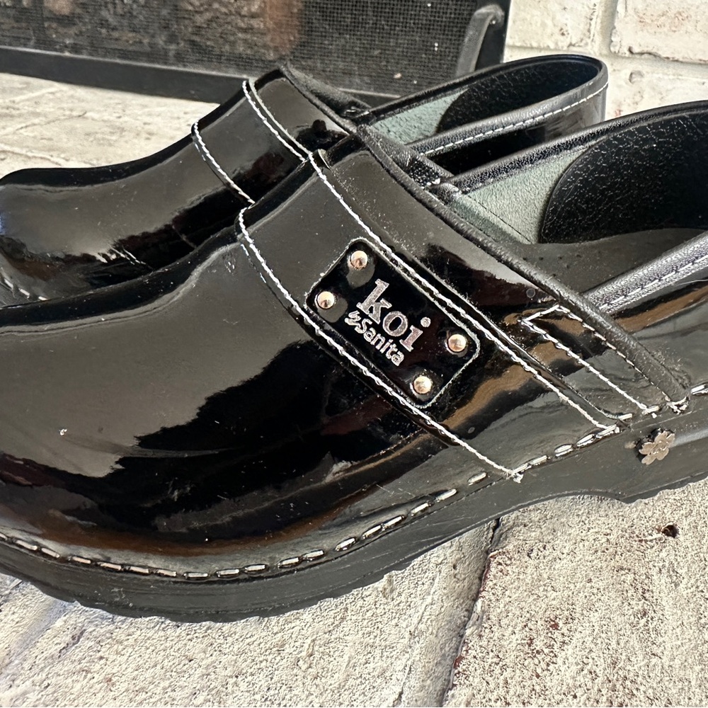 Koi by Sanita Black Patent Leather Clogs